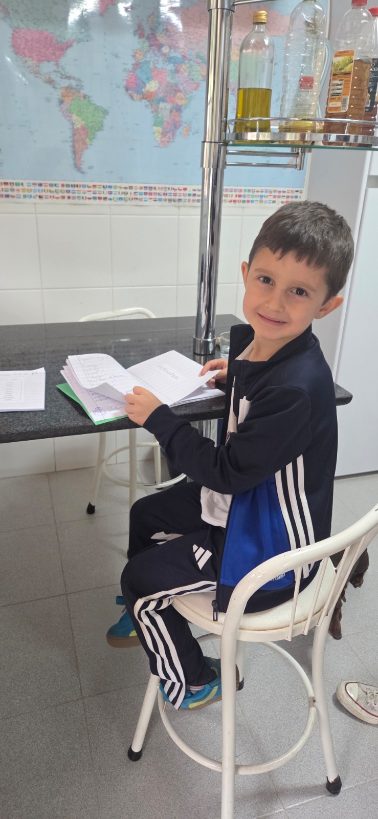 Elliot doing his homework at our house this week