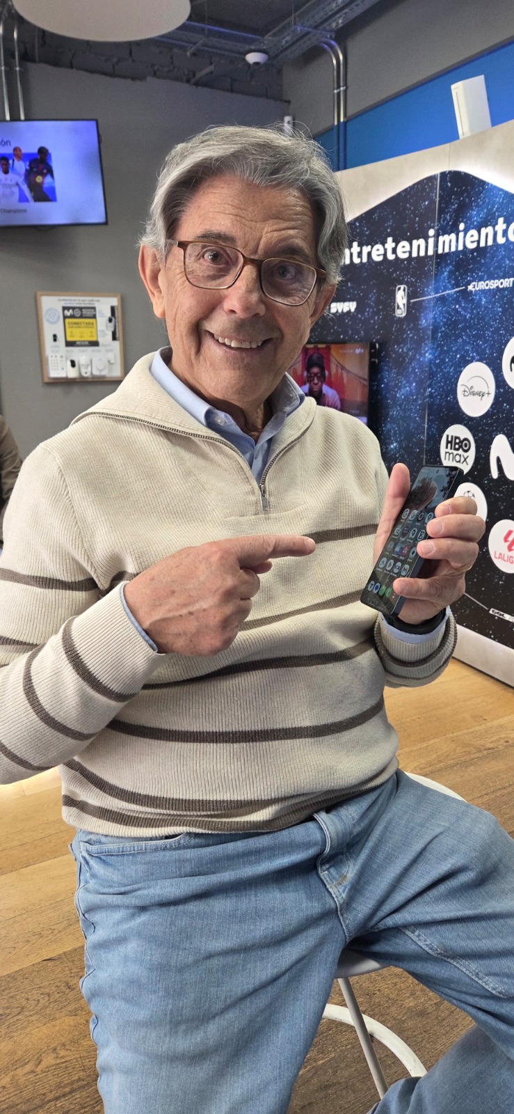 Eladio happy with his new phone