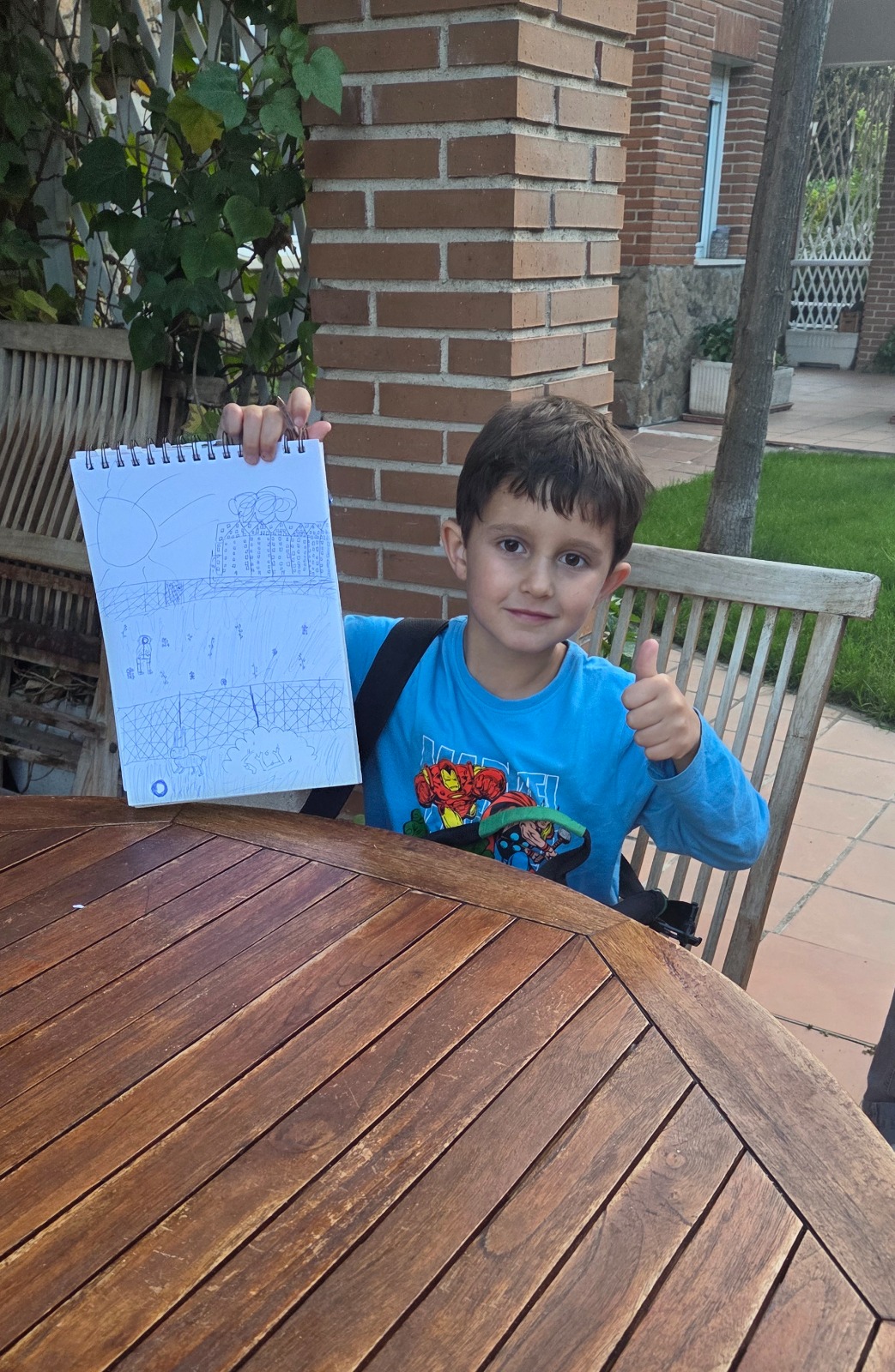 Elliot showing me his latest drawing. He is so good at drawing I have to say